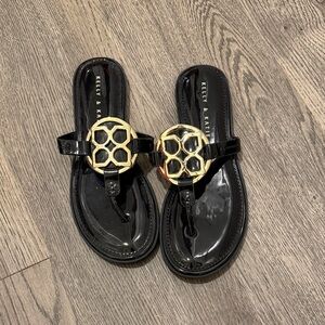Kelly & Katie Glossy Black Sandals with Gold Accents